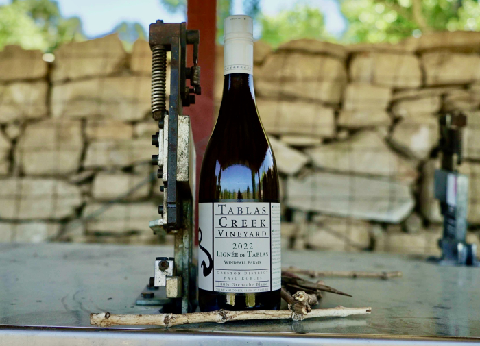 Lignee bottle next to grafter - landscape Lignee bottle next to grafter - landscape