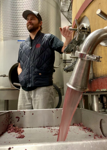 Craig draining a tank of Grenache Craig draining a tank of Grenache