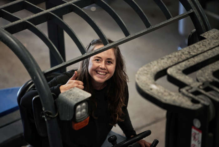 Kayja Mann on a forklift at Tablas Creek Kayja Mann on a forklift at Tablas Creek