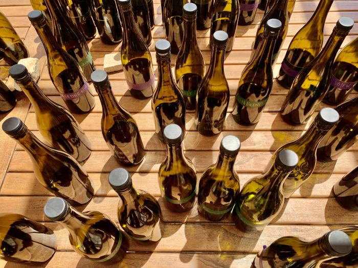 Blending bottles on patio from above - 2020 reds Blending bottles on patio from above - 2020 reds