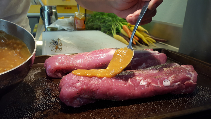 Spooning glaze on meat Spooning glaze on meat